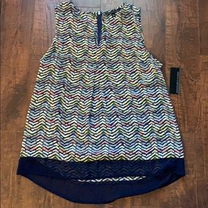 Beautiful high/low sleeveless sheer tunic